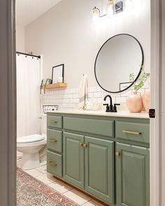 Bathroom vanity green gold subway tile black faucet round mirror Pop Of Color Bathroom Vanity, Green Cabinets Bathroom, Light Green Bathrooms, Bathroom Cabinet Colors, Green Bathroom Vanity, Green Vanity, Bathroom Vanity Makeover, Village Green, Foam Rollers