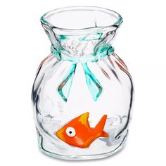 a glass vase with a goldfish in it and a blue bow on the top