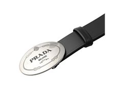 This classic Prada belt features a matte silver oval buckle with Prada Milano logo engraved. Constructed with saffiano cross-grain leather, this belt is practical for everyday wear.       Model: 2CM046    Blue Saffiano Leather  Brushed matte silver oval buckle  Size: 95/38    Height: 1.75  Includes Prada dust bag and authenticity cards  Made in Italy Silver Leather Belt Buckle With Logo Plaque, Silver Leather Belt With Logo Plaque, Classic Leather Belt With Silver-tone Logo Plaque, Elegant Silver Belt With Metal Logo, Business Leather Belt Buckles With Metal Logo, Modern Business Belt Buckles With Logo Plaque, Leather Belt Buckles With Metal Logo For Business, Modern Business Belt Buckle With Logo Plaque, Modern Leather Belt With Engraved Logo