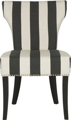 a black and white striped chair with studded trimmings on the backrest