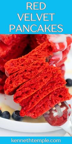 red velvet pancakes on a white plate with blueberries