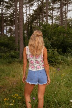 This Ecru and Pink Alisha Top features intricate crochet details, a slightly cropped fit, and charming pink and green floral patterns. Its lightweight fabric allows for a hint of transparency, adding a touch of allure to your look. Ophelie is also wearing the Blue Franck Denim shorts and the Pink Emma Cardigan One size (fits from US sizes 4-8) Length 16.9 in - Width 17.3 in 100% Cotton Washing: 86°F Bohemian Lace Top With Floral Print, Summer Lace Top With Floral Embroidery, Floral Embroidered Lace Top For Summer, Floral Embroidery Lace Top For Summer, Summer Floral Print Lace Top, Lace Floral Print Tops For Beach, Beach Lace Top With Floral Print, Lace Floral Print Beach Tops, Beach Lace Tops With Floral Print