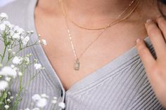 Embrace elegance and meaning with our Wish Rectangle Necklace. Featuring a delicately hand-stamped dandelion, this necklace is a beautiful symbol of hope, healing, and resilience. Crafted from high-quality 14k gold fill, it combines durability with a touch of luxury. Product Features: *Material: 14k Gold Fill. *Pendant Dimensions: 6x13.5mm Rectangle Tag - showcases a finely illustrated dandelion. *Chain Lengths: Available in 16", 18", and 20" - choose your preferred length for a perfect fit. *Handcrafted: Each piece is lovingly illustrated and stamped by hand in our Bend, OR studio. Why You'll Love It: *Symbolic Design: The dandelion design represents hope and strength, making it a meaningful piece for everyday wear. *Elegant and Versatile: Perfect for layering or wearing on its own, this Dandelion Chain, Healing Symbol, Healing Symbols, Rectangle Necklace, Dandelion Designs, The Dandelion, Beautiful Symbols, Hope Symbol, Delicate Jewelry