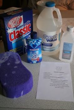 various cleaning supplies are sitting on the counter