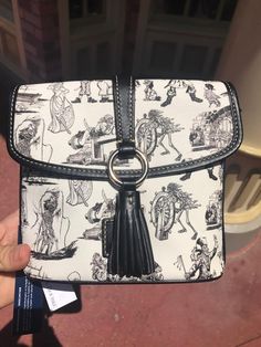 New Pirates Of the Caribbean Dooney and Bourke Bags Spotted at Magic Kingdom! The Pirates Of The Caribbean, Crazy Day, Disney Bags, Disney Bag