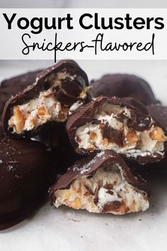 chocolate covered candies are stacked on top of each other with the words, yogurt clusters snickkers - flavored