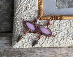 ✦Beautiful and original soft pink/fuchsia/hot pink/ brown/ antique copper bohemian Czech glass earrings. ✦Spiritual Jewelry designed and carefully handmade by Rushweaver Jewellery in an ancient earthy tribal style. ✦These boho beauties dangle 70mm from the top of nickel free brass, antique copper plated ear wires. For all free spirited women who want to enjoy their unique style! Handmade Pink Spiritual Earrings, Bohemian Pink Wire Wrapped Beaded Earrings, Handmade Spiritual Pink Earrings, Bohemian Pink Earrings For Pierced Ears, Bohemian Czech Glass Earrings For Festivals, Bohemian Purple Earrings With Czech Glass, Bohemian Purple Earrings Made Of Czech Glass, Bohemian Czech Glass Earrings With Ear Wire, Bohemian Nickel-free Czech Glass Earrings