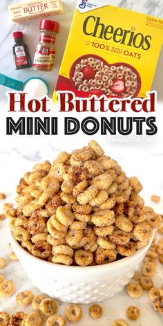 there is a bowl full of mini donuts with the words, hot buttered mini donuts