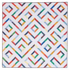 an abstract quilt with many different colors and shapes on it, including the diagonals