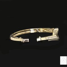 Description: A vintage cuff made of 14K gold with diamonds set in it. Specifications: Metal: 14K gold Stone: Diamonds Item Code: 889407 Classic Diamond Bracelet For Evening, Luxury Cuff Bracelet With 17 Jewels For Anniversary, Luxury Hand Set Cuff Bracelet For Anniversary, Formal White Gold Cuff Bracelet With Single Cut Diamonds, Timeless Diamond Bracelet For Evening, Formal White Gold Cuff Bracelet With Diamonds, Timeless Evening Diamond Bracelet, Exquisite Yellow Gold Diamond Bracelet For Formal, Exquisite Yellow Gold Diamond Bracelet For Formal Occasions