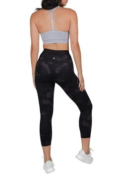 Lounge around in luxury with our innovative LUX material! This super soft, breathable, and thick fabric feels amazing against your skin and also stretches to move with you. Due to the high quality, durable fabric, these camo capris are a great choice for a variety of activities like running. Supportive waistband. Pulls on. Fitted leg. High waisted. Camo print. Approx. 10" rise, 22" inseam (size S). Imported    This item cannot be shipped to Canada. Compression Tights For Streetwear, Black Sports Leggings With Snug Fit, Athleisure Sports Leggings, Black Snug Fit Sports Leggings, Compressive Mid-thigh Athleisure Leggings, Sporty Workout Leggings, Mid-thigh Length, Black Snug Fit Leggings For Sports, Black Leggings For Sports, Compressive Mid-thigh Length Athleisure Leggings