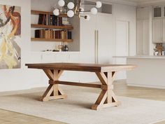 a wooden table sitting in the middle of a living room next to a book shelf