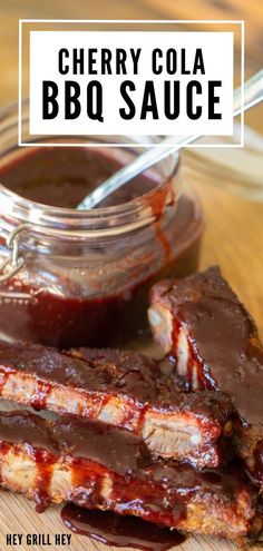 bbq sauce and ribs on a cutting board with the words cherry cola bbq sauce