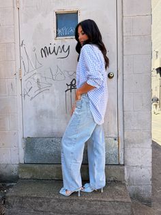 refresh your button up collection with this trendy blue gingham print shirt! made with a textured fabric, and oversized fit. this piece can be styled in multiple ways:: buttoned up for a polished look, half-tucked for a relaxed vibe, or unbuttoned as a trendy outer layer! browse more tops! size, details & care model size Dee is 5'5" 135lbs with a 34" chest, 27" waist, and 38" hip wearing a small *runs big details 45% cotton, 55% polyester care hand wash cold do not wring or twist use only non ch Relaxed Fit Plaid Shirt For Day Out, Relaxed Fit Gingham Button-up Shirt, Spring Everyday Plaid Shirt, Spring Trendy Gingham Shirt, Casual Gingham Shirt For Daywear, Dressy Pants, Blue Gingham, Gingham Print, Dressy Tops