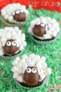 some cupcakes with marshmallows on them and eyes in the shape of sheep