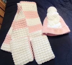 Moss stitch pink and white pocket scarf and hat set. Made with fleece yarn. Handwash only. Cozy White Crochet Hat, Cozy Warm White Crochet Hat, Warm Cozy White Crochet Hat, White Hand Knitted Crochet Hat For Cold Weather, White Crochet Knitted Hat For Cold Weather, Cozy White Crochet Hat For Cold Weather, Crochet Pocket Scarf, Fleece Crochet, Crochet Pocket