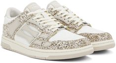 Low-top glittered grained leather sneakers in white and gold tone. · Logo plaque at lace-up closure · Logo patch at padded tongue · Padded collar · Graphic appliqués at sides · Logo embossed at heel tab · Mesh lining · Treaded rubber sole Supplier color: Gold Low Sneakers, White Shop, Leather Sneakers, Low Top, Patch Logo, Rubber Sole, Gold Tones, Women Wear, White Gold