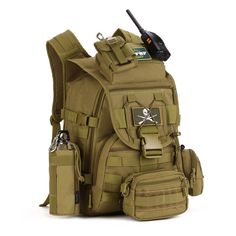 an army green backpack with a radio attached to the back and two small pouches in front