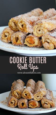 two white plates topped with cookies and roll ups next to a cup filled with powdered sugar