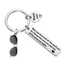 a keychain with two hearts on it that says, thank you're proud for