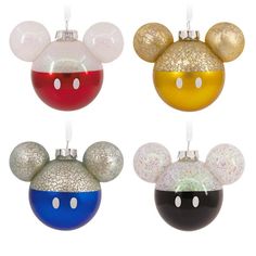 three mickey mouse ornament ornaments in different colors