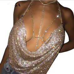 Glamorous Fitted Halter Top For Club, Fitted Halter Top For Party, Party Season Fitted Halter Top, Elegant Backless Halter Top For Party Season, Metallic Halter Top For Summer Party, Elegant Halter Neck Top With Sequins, Elegant Sequined Halter Neck Top, Summer Party Metallic Halter Top, Elegant Sleeveless Halter Top For Club