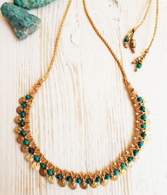 A charming and tribal Chrysacola and brass adjustable necklace, hand woven by me using the ancient technique of micro macramé. I make this neckalce to order from superior quality Italian waxed cord (water resistant, does not tear or fray), solid brass spiral charms, and Chrysacola beads Yours will be made especially for you so please allow me 5 days to weave it prior to shipping times. comes in a gift box Bohemian Turquoise Brass Jewelry, Turquoise Bohemian Brass Jewelry, Handmade Turquoise Brass Necklace, Traditional Turquoise Handwoven Jewelry, Artisan Turquoise Necklace In Gold For Festival, Turquoise Macrame Necklace For Festival, Bohemian Necklaces With Gold Beads For Festivals, Artisan Gold Turquoise Necklace For Festival, Bohemian Gold Beaded Necklaces For Festivals