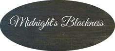 a black and white sign that says midnight's blackness