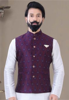 Art Silk Jacquard Nehru Jacket in Purple This Readymade Chinese Collar Neck and Sleeveless attire is Enhanced with Buttons and Pockets Do note: Top, Bottom and Footwear shown in the image is for presentation purposes only. Half to one inch may vary in measurement. (Slight variation in actual color vs. image is possible) Luxury Nehru Jacket With Mandarin Collar For Festive Season, Luxury Nehru Jacket For Spring, Luxury Designer Nehru Jacket For Ceremonial Occasions, Luxury Nehru Jacket For Semi-formal Events, Luxury Traditional Nehru Jacket For Puja, Luxury Elegant Nehru Jacket With Stand Collar, Luxury Classic Fitted Nehru Jacket, Luxury Tailored Nehru Jacket For Party, Luxury Long Sleeve Nehru Jacket For Formal Occasions