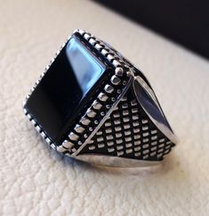 Rectangular silver aqeeq flat natural black onyx semi precious agate gemstone men ring sterling silver 925 jewelry all sizes fast shipping Risk free Quality guarantee policy : If you are not satisfied with your item for any reason simply send it to us and you will get a replacement or refund . please write or choose your size with the order and we will size it for you . Our ring is handcrafted mostly with a few simple tools . but some methods are used in casting like lost wax method . sterling s Silver Jewelry With Rectangular Stone And Polished Finish, Classic Onyx Ring Jewelry, Silver Jewelry With Polished Rectangular Stone, Classic Onyx Ring, Adjustable Silver Onyx Ring, Classic Silver Jewelry With Rectangular Stone, Black Ring With Polished Edges, Classic Adjustable Jewelry With Stone Setting, Silver Ring With Polished Finish And Rectangular Stone