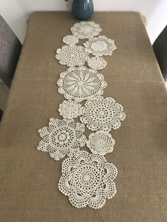 the table is covered with white crochet doily