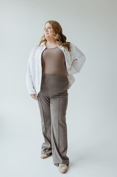 Your new favorite mid to plus-size dress pants are here! They are slightly flared, pull-on, and have a great lightweight textured fabric with great stretch! Add these classic, sophisticated pants to your wardrobe and rock them for years! The fabric has smoothing technology while feeling like you are wearing sweatpants and feel so luxurious. They will be in your wardrobe for years! Fits true to size. Wash Machine wash, cold. Lay flat to dry. Fabric 70% Polyester 25% Viscose 5% Elastane Measurements Size Waist Rise Body Length 12 36" 12" 46" 14 38" 12.5" 46" 16 40" 12.5" 46" 18 42" 13" 47" 20 44" 13.5" 47" 22/24 48" 14" 47" *We understand that each body type is different, so posted above are measurements. These measurements are taken from one garment; however, garments even in the same size Textured Fabric, Pull On Pants, Favorite Dress, Plus Size Dress, Body Types, Dress Pants, Lay Flat, Light Brown, Like You