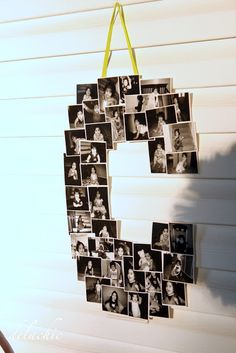 a letter made out of photos hanging on a wall