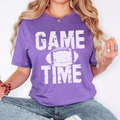 Are you ready for some football!? Get game day ready with this adorable vintage football tee! These relaxed fit tees pair perfectly with jeans and sneakers or booties! Size Guide: we recommend your true size for a loose fit or size down for a fitted fit. Tees are Unisex. Heather blend shirts are 52/48 Cotton/ Poly Blend and Solid Shirts are 100% Cotton. Shirts are Unisex. Popular Graphic Tees, Heather Storm, Football Graphic Tee, Football Tee, Got Game, Football Tees, Vintage Football, Columbia Blue, Sports Mom