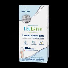 a box of true earth laundry deterant on a black background