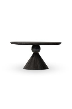 a black table with an oval top and two small round bases on each side, in front of a white background