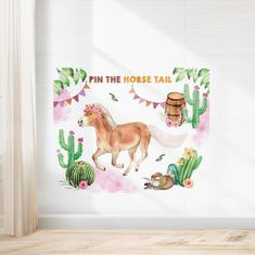 a wall with a horse painted on it next to cactuses and cacti