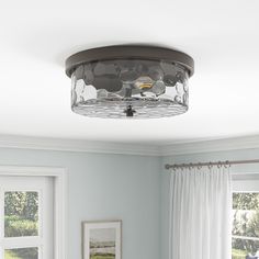 This stunning flush mount ceiling light with metal finishes and glass design, fully presents a charming modern farmhouse appeal. It features an enclosed water ripple glass cover with metal canopy, surrounded by hand-treated Oil Rubbed Bronze metal bands, adding a visual farmhouse aesthetics to a modern flair. Centered by 2 outspread arms inside offer elegant shine while enhancing plenty of ambient glow for your bedroom, kitchen, entryway, hallway and bathroom. Aiwen 2-Light Bronze Led Flush Moun Flush Mount Kitchen Lighting, Vanity Light Bar, Flush Mount Lights, Metal Canopy, Light Fixtures Flush Mount, Barn Lighting, Low Ceiling, Led Chandelier, Flush Mount Lighting