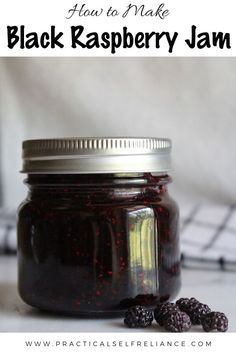 black raspberry jam in a mason jar with fresh berries on the side and text overlay reading how to make black raspberry jam