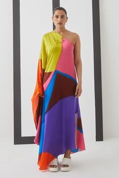 Multicolor one shoulder gown with abstract swirl print and kimono sleeve on one side.
Component: 1
Pattern: Print
Type Of Work: Abstract Print
Neckline: One Shoulder
Sleeve Type: Kimono Sleeve
Fabric: Vegan Silk
Color: Multi Color
Other Details: 
Asymmetrical hem
Occasion: Resort - Aza Fashions Gown For Women, London College Of Fashion, One Shoulder Gown, Ladies Gown, Gowns Online, Dress Crafts, Dressed To Kill, Kimono Sleeve, Asymmetrical Hem