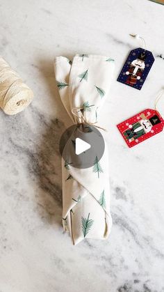 a white marble counter top with various items on it and an ornament next to it