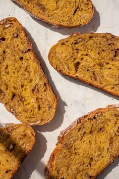 slices of bread sitting on top of a piece of paper