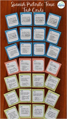 the spanish tense task cards are arranged on a table with numbers and words in them