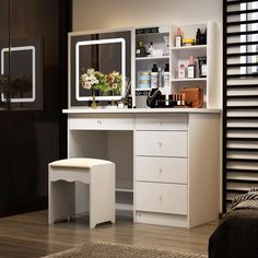 a white vanity with mirror and stool next to it in a living room or bedroom