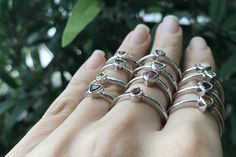 "A collection of dainty stackable tourmaline sterling silver ring in a variety of colors and shapes is sure to impress your boho friends. These are one-of-a-kind rings which we have chosen each stone and set it in a simple bezel setting with a low profile. Wrapped in a box ready for gift-giving.(r-nc-92) Choose your favorite Tourmaline Ring from the last photo We offer sizing services for a nominal fee contact us for pricing ---> Don't know your ring size? Purchase our ring sizing gauge https Silver Tourmaline Promise Ring, Stackable Tourmaline Jewelry For Anniversary, Silver Tourmaline Birthstone Ring With Gemstone, Silver Tourmaline Birthstone Ring Gift, Stackable Tourmaline Jewelry As Gift, Stackable Tourmaline Jewelry Gift, Adjustable Stackable Emerald Ring In Sterling Silver, Pink Watermelon, Dainty Rings