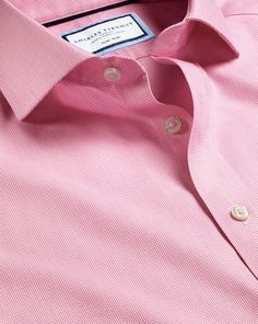 100% cotton with mechanical stretch, Available in classic, slim and extra slim fit, Spread collar, Classic and slim fit: back pleats, Extra slim fit: back darts, Mitred button cuff with two buttons or square french cuff, Machine washable - Cutaway Collar Non-Iron Clifton Weave Shirt - Pink | Men's Charles Tyrwhitt Cutaway Collar Non-Iron Clifton Weave Dress Shirt - Pink Single Cuff Size 14.5/32 Cotton Elegant Pink Cotton Dress Shirt, Classic Pink Dress Shirt With Spread Collar, Pink Cotton Dress Shirt, Classic Pink Cotton Dress Shirt, Formal Pink Button-up Dress Shirt, Weave Dress, Charles Tyrwhitt Shirt, Square French, Charles Tyrwhitt