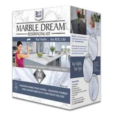 the marble dream kit includes an image of a woman standing in front of a kitchen