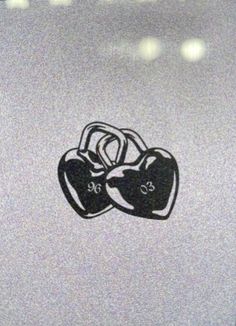 two hearts sticker on the side of a refrigerator