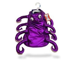 an octopus stuffed animal hanging from a hook on a white background with the tag attached to it's chest