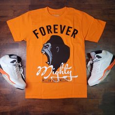 New Forever Mighty Orange Short Sleeve Graphic Tshirt. New With Tags! Orange Graphic Print Tops For Streetwear, Orange Letter Print Tops For Streetwear, Sporty Orange T-shirt With Letter Print, Orange Graphic, Drippy Outfit, Street Fashion Men Streetwear, Men Streetwear, Orange Shorts, Orange Shirt